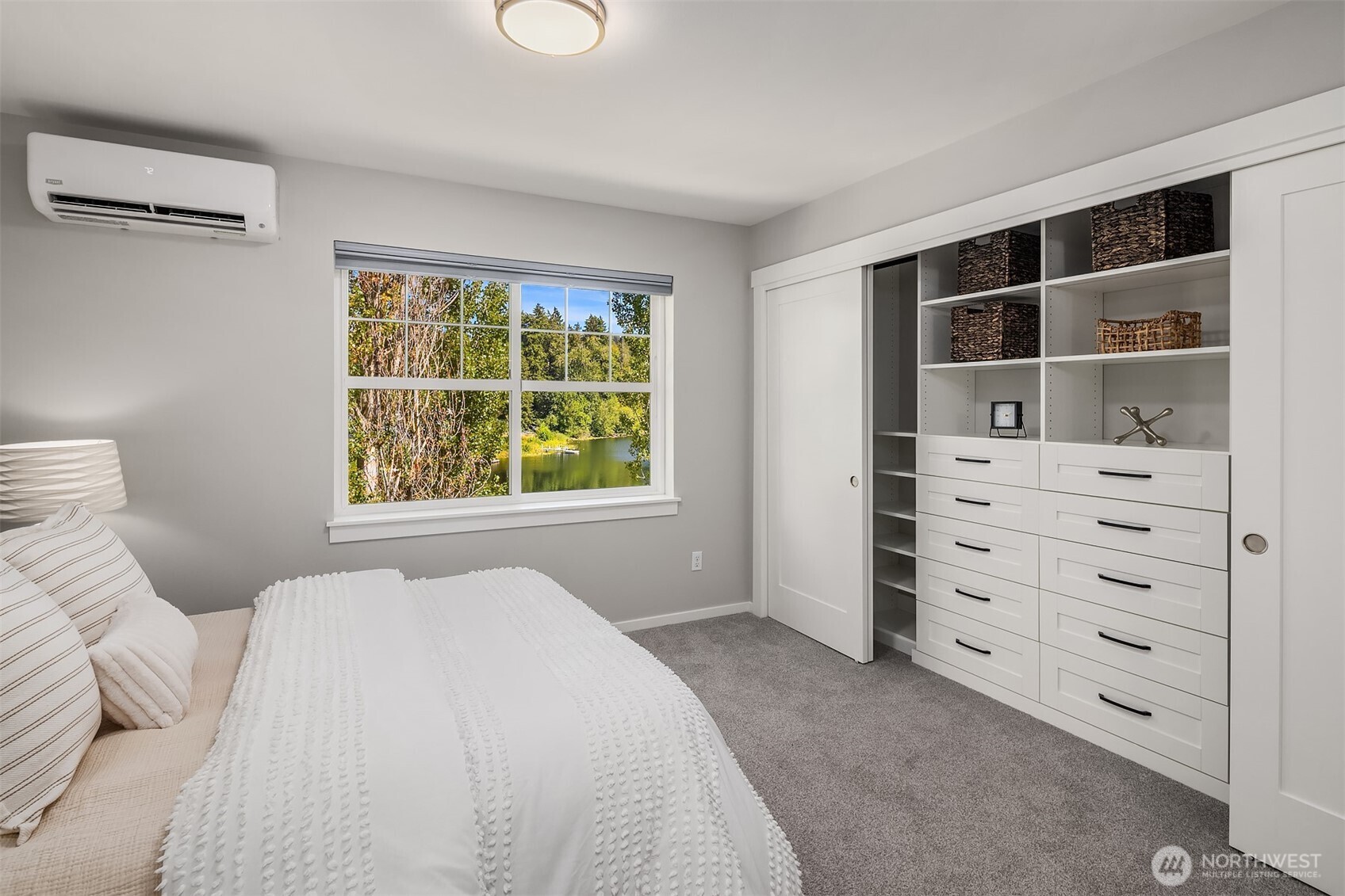 Custom design closets were added to the primary suite, with lighting and so much drawer space for your clothes. Mini splits in both bedrooms, plus the main floor for year round comfort. Black out blinds installed in both bedrooms