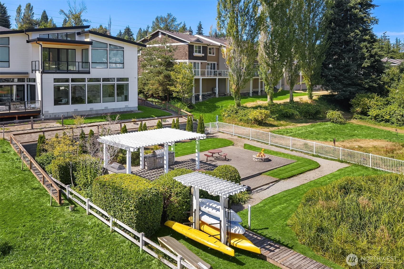 A wonderful outdoor community space that you'll actually use. Covered grill, fire pit, kayaks. Head out on the water before cooking some burgers with your friends and neighbors.