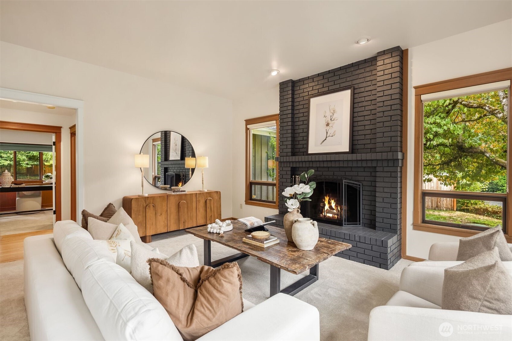 High Ceilings, with large windows allow lots of natural light into this formal living room