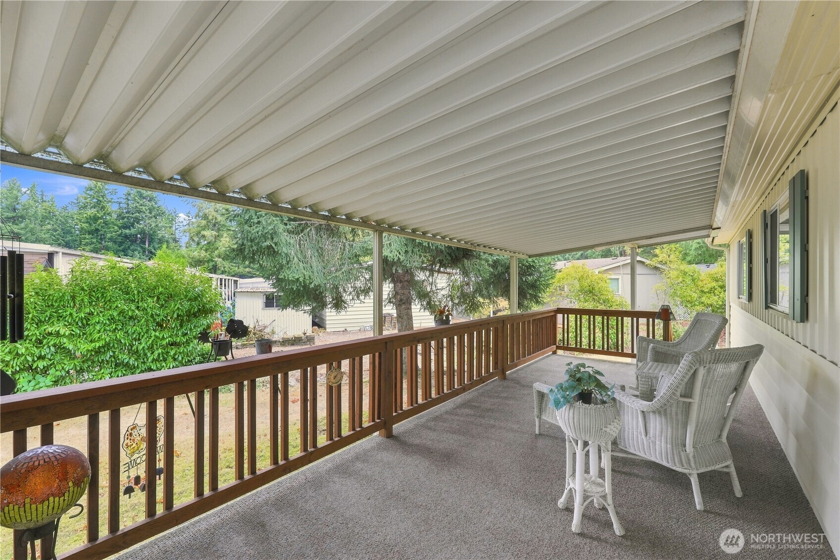 This large covered deck is a terrific place to enjoy the outdoors.
