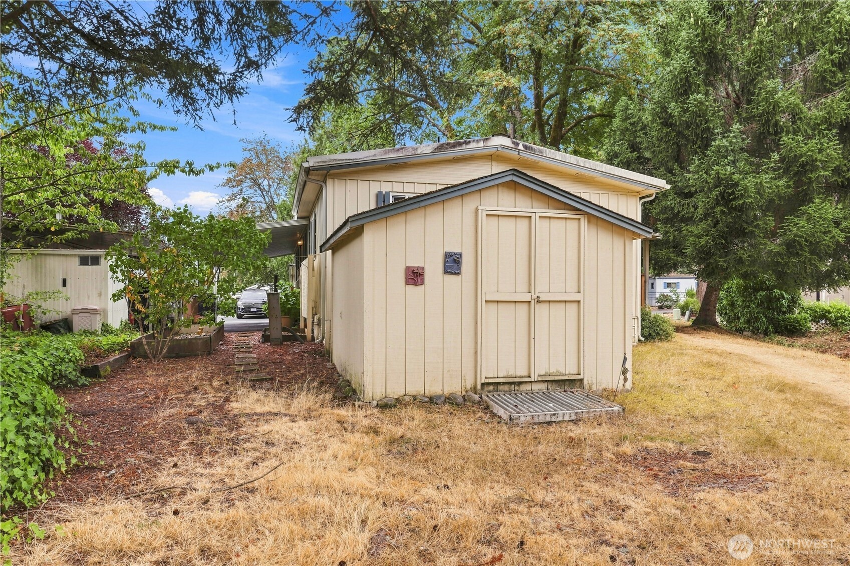 Large wooden shed with power.