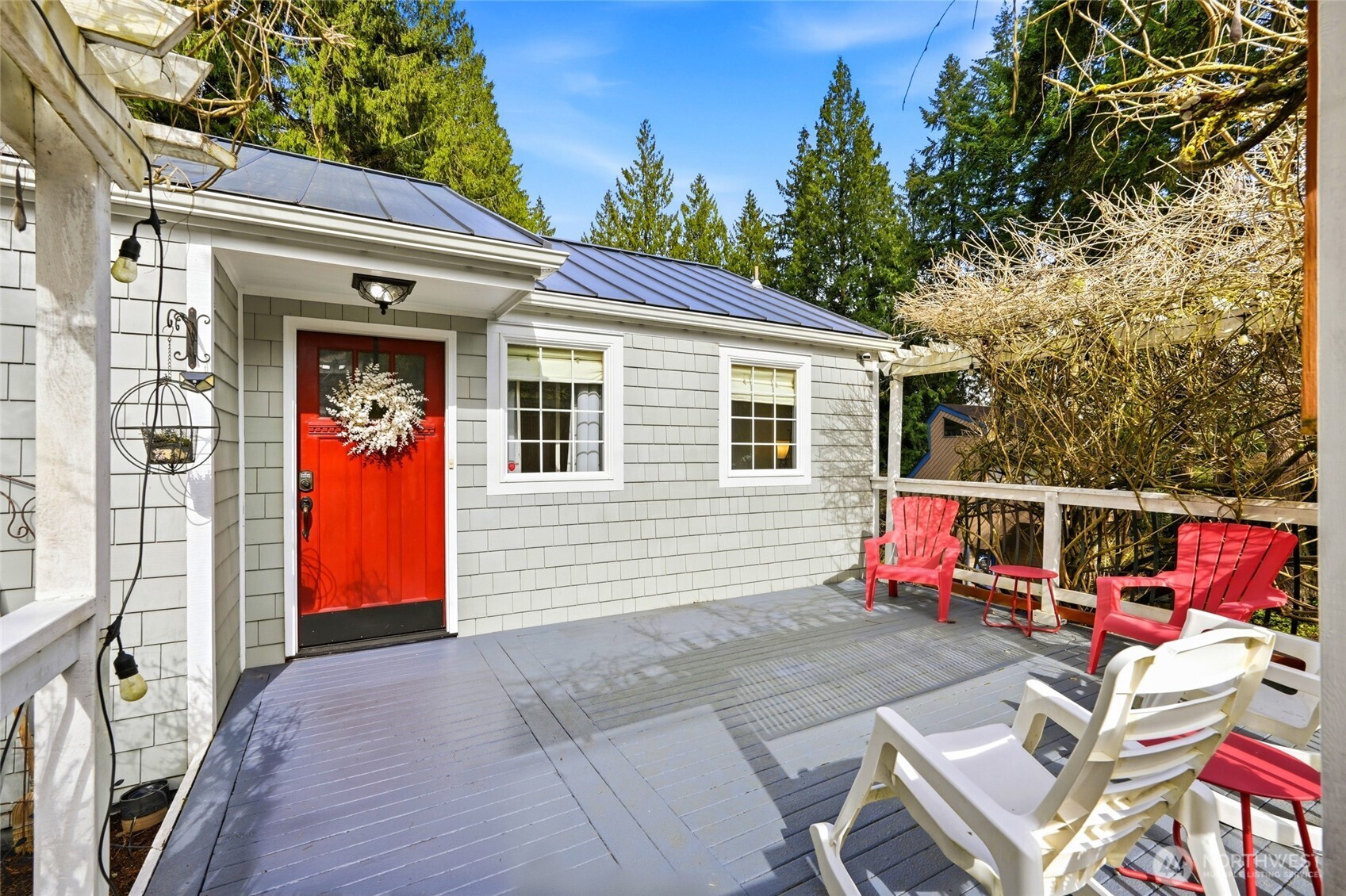 Another pic of the front of the home with nice patio and wait to see all the greenery bloom in summer.