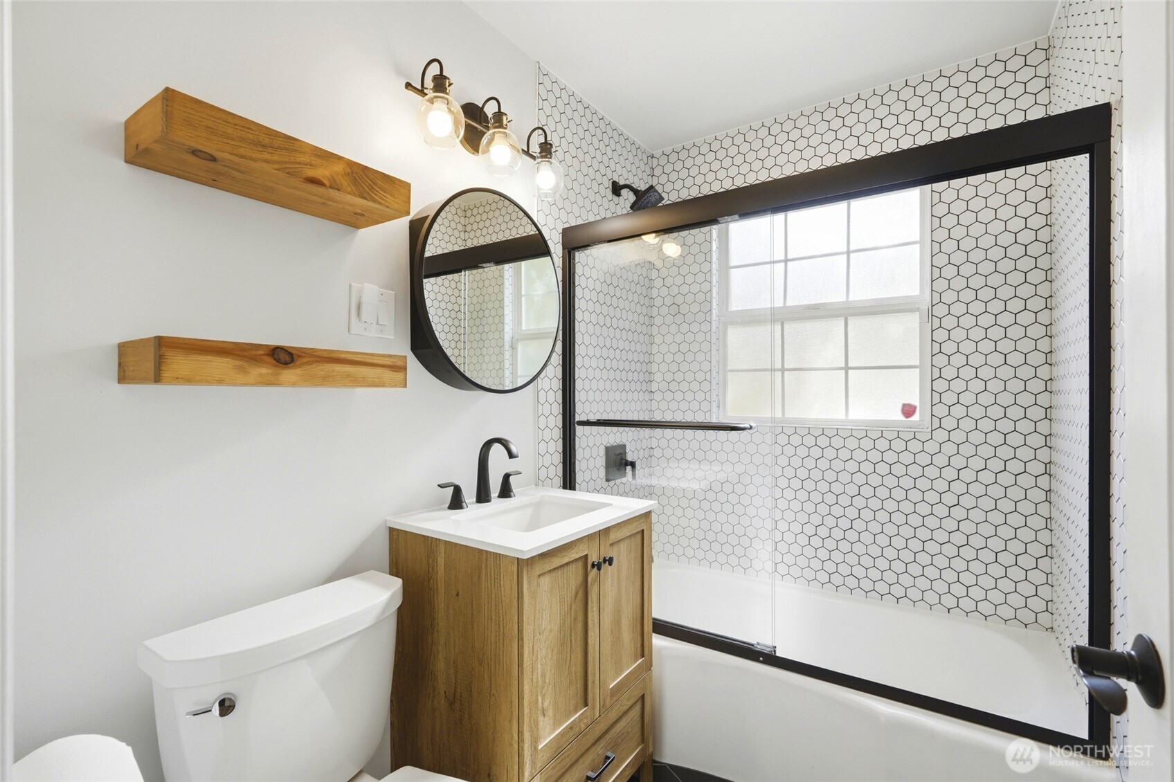 Main Floor Bathroom Recently updated and nicely designed.