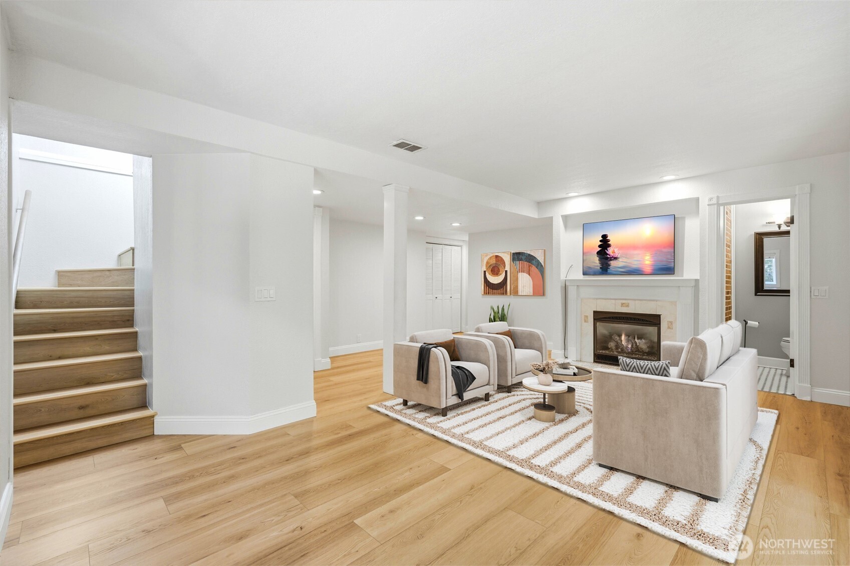 Lower Level Family room! with a separate sunroom entrance also leading to the backyard!