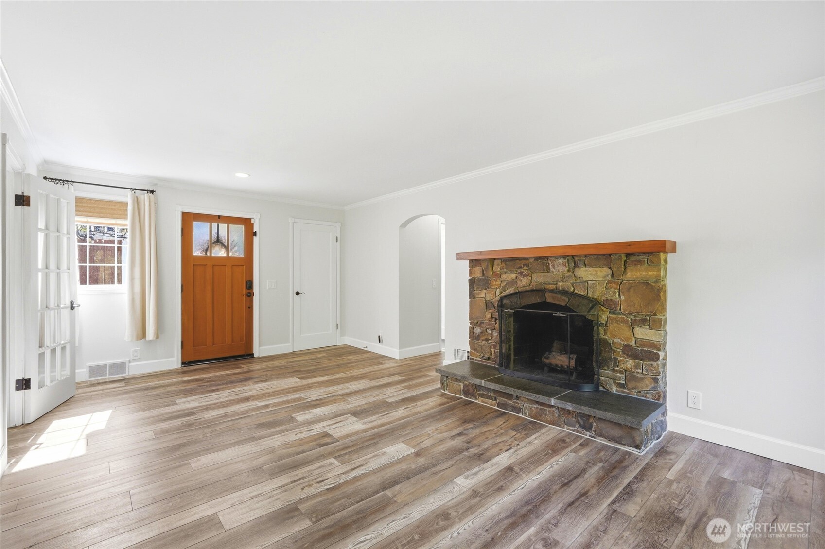 Step inside your Family room with newer floors and lots of character!