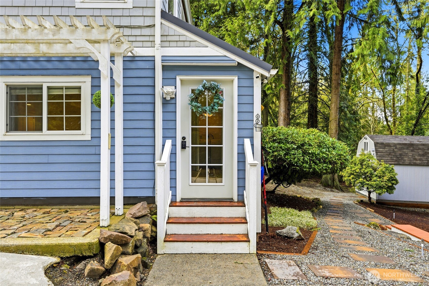 Separate entrance from the side lower level to the sunroom leading to the family room.