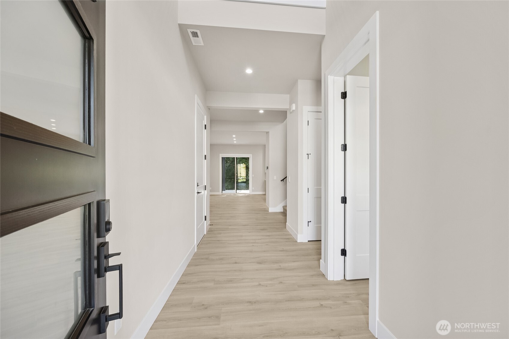 An inviting entry with vaulted ceilings and a thoughtfully designed layout draws you into this home!