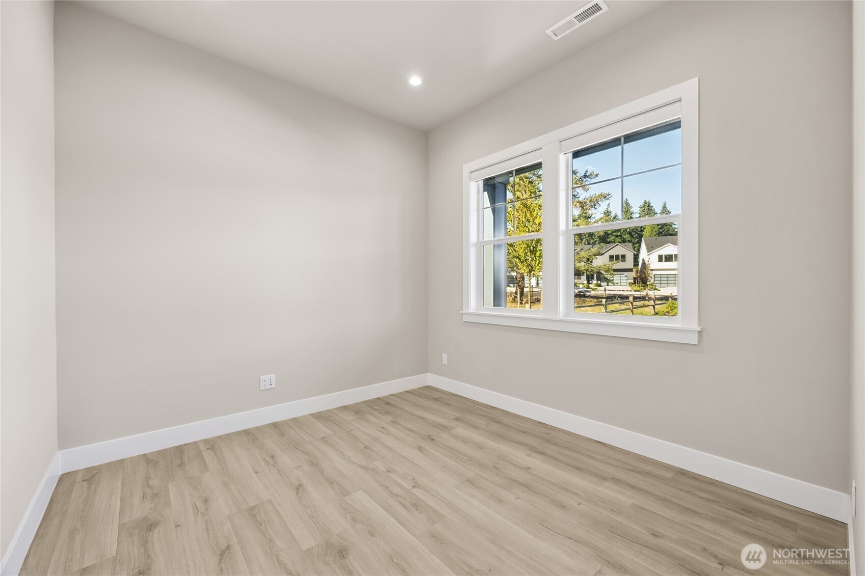Bright and flexible main level den easily adapts to your lifestyle as a home office, library, playroom or guest retreat.