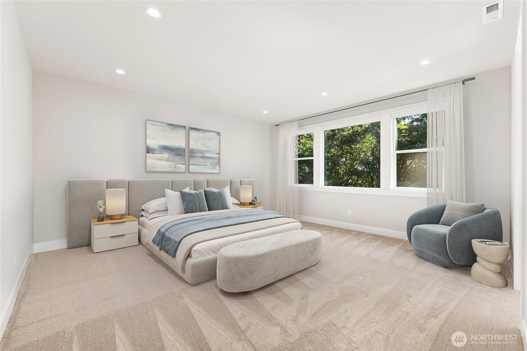 Unwind in the spacious primary suite, featuring oversized windows, natural lighting, and a peaceful atmosphere. Virtually staged.