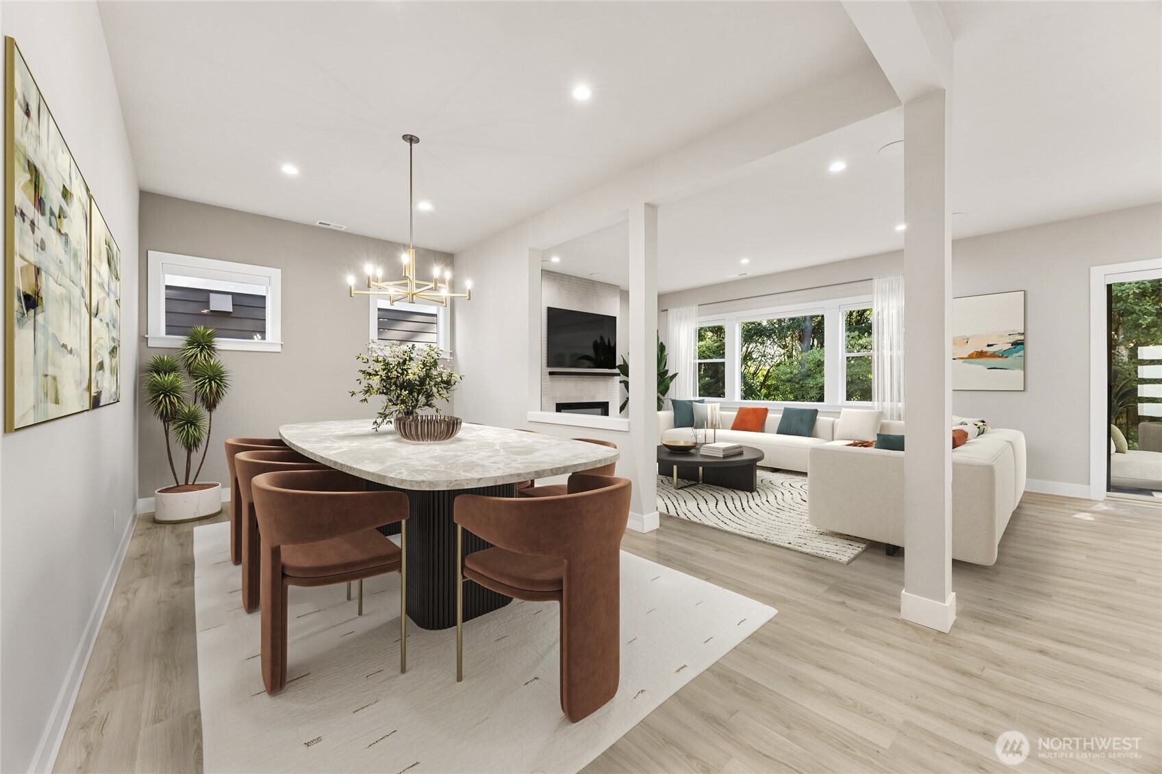 Open concept dining area flows into great room, thoughtfully connected for effortless entertaining! Virtually staged.