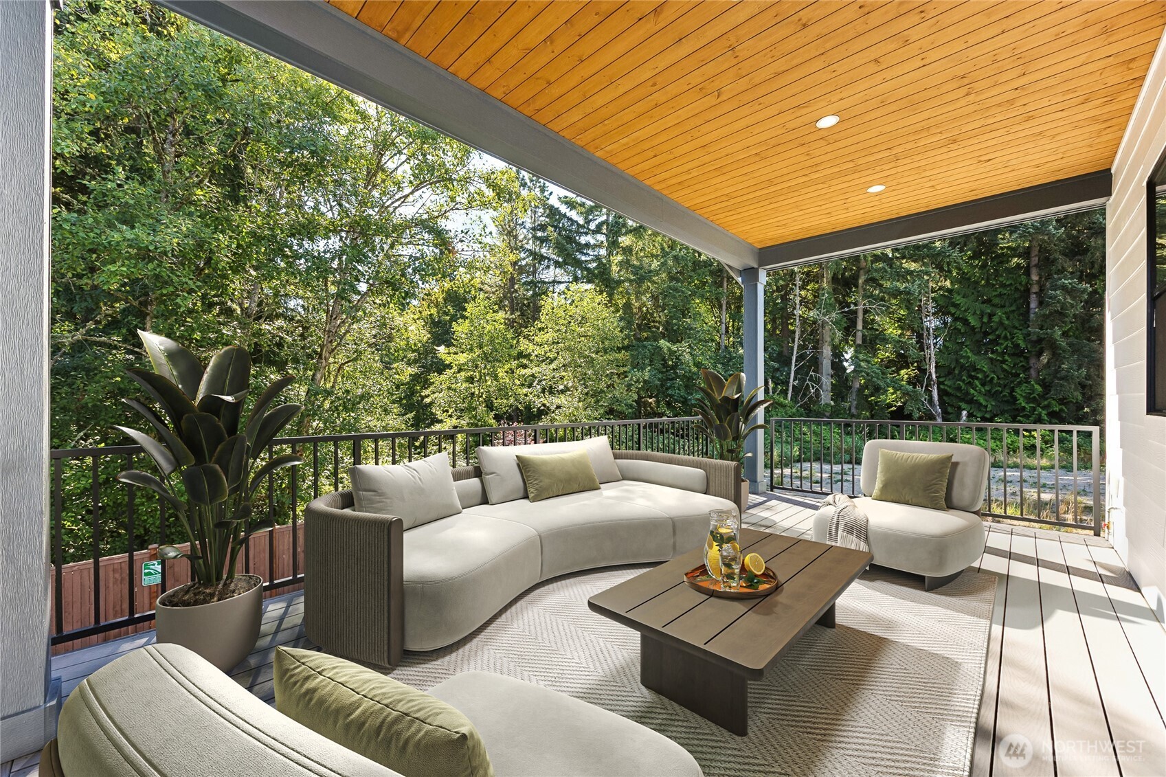 Enjoy seamless indoor-outdoor living from the spacious covered deck, designed to enjoy during any season. Virtually staged.