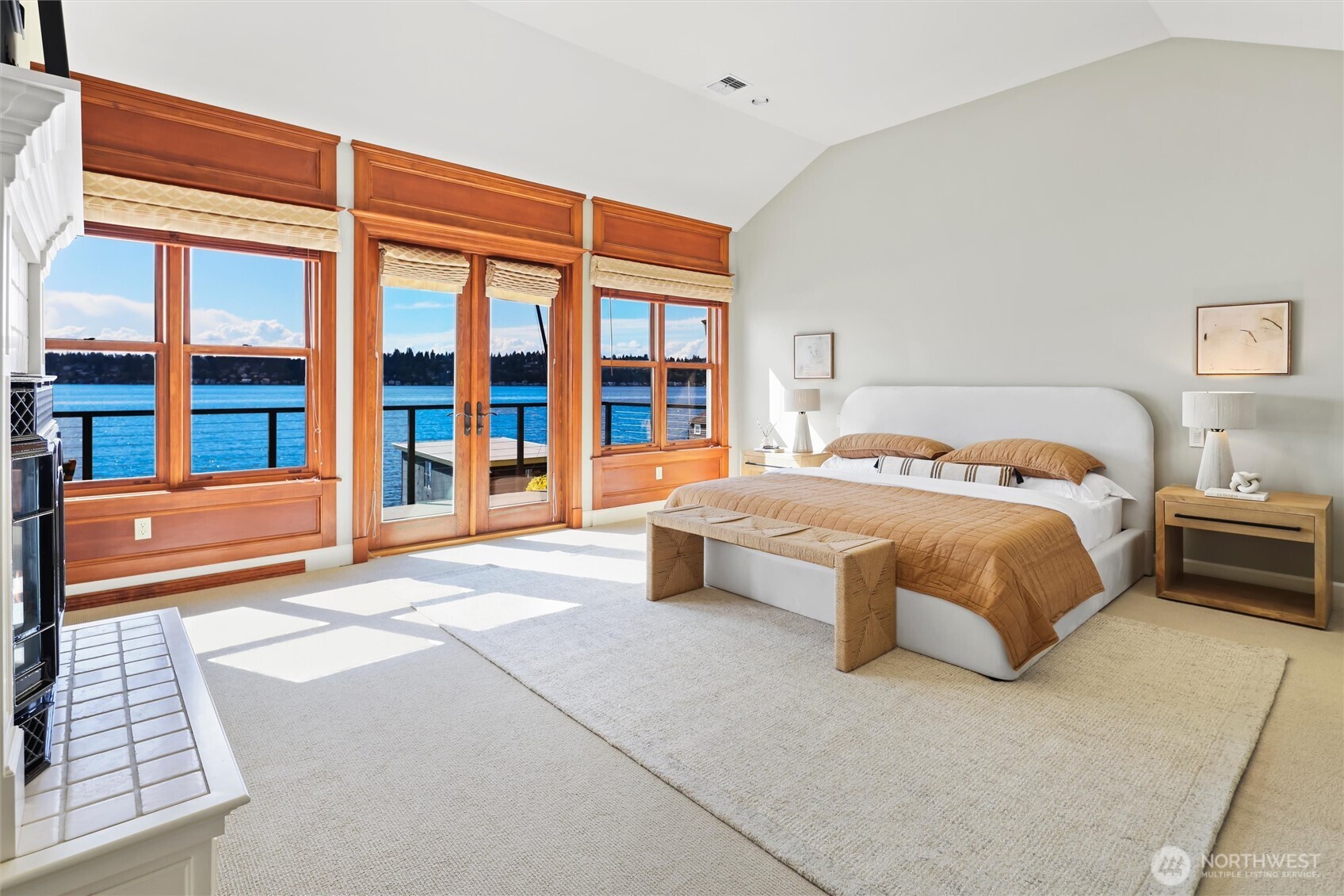 Spacious primary suite offers a luxurious five-piece ensuite bath and direct access to the beautiful view deck