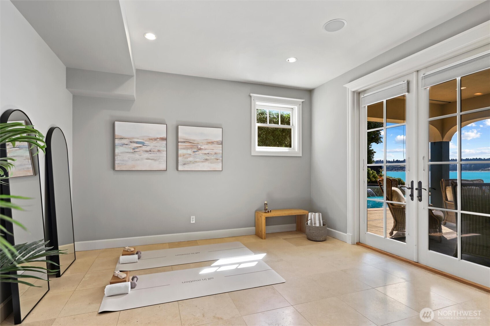 Bedroom, staged as fitness room, with ensuite bath