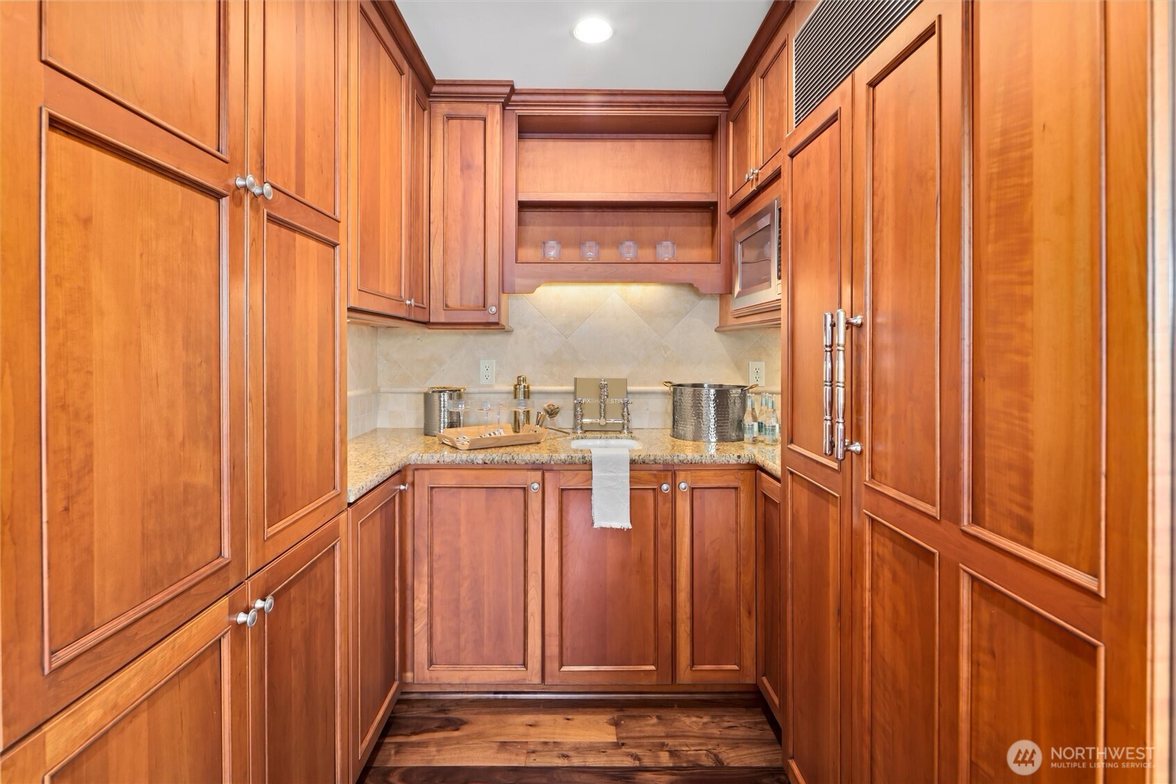 Adjoining kitchen space & wet bar