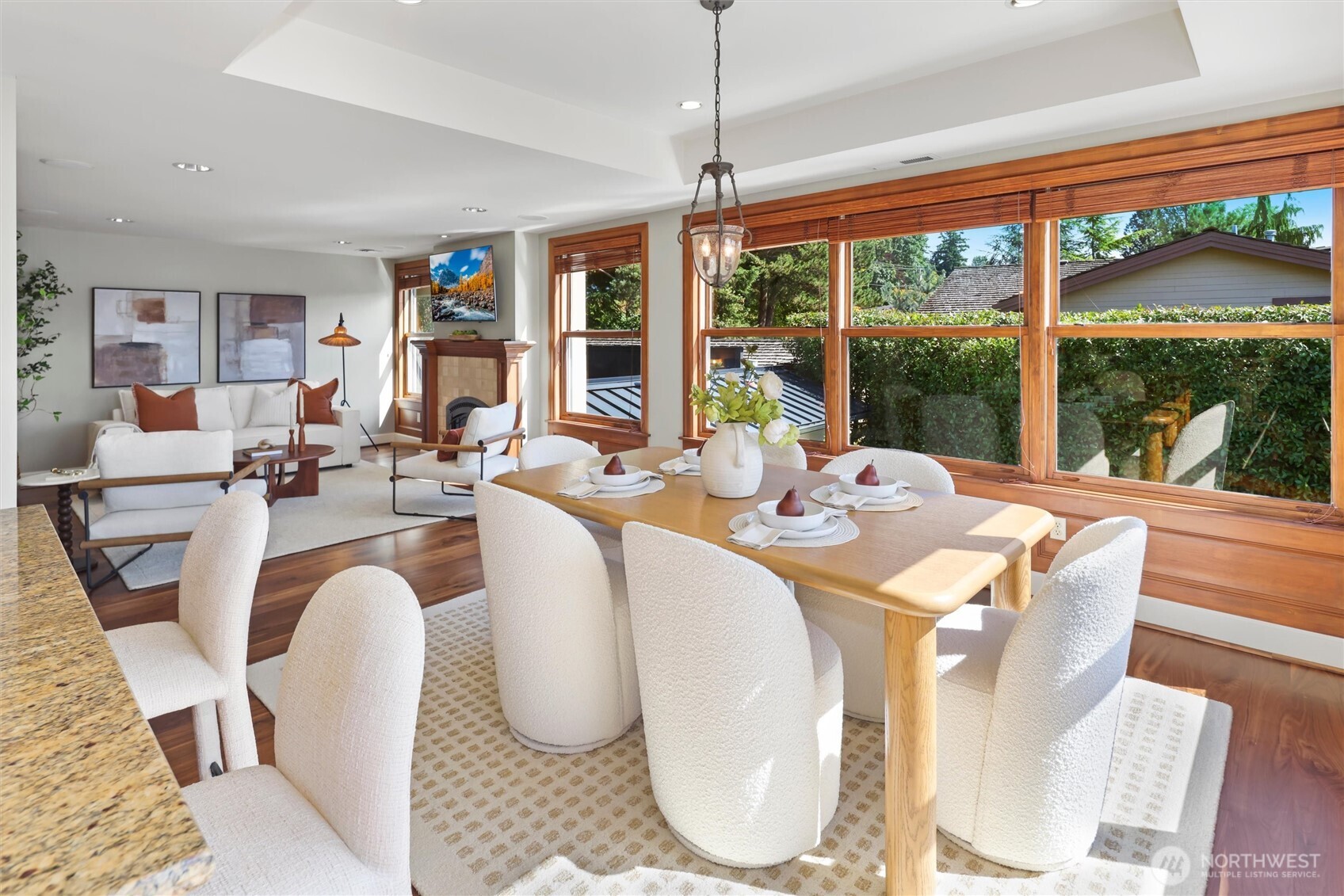 Informal dining area & cozy family room with gas fireplace