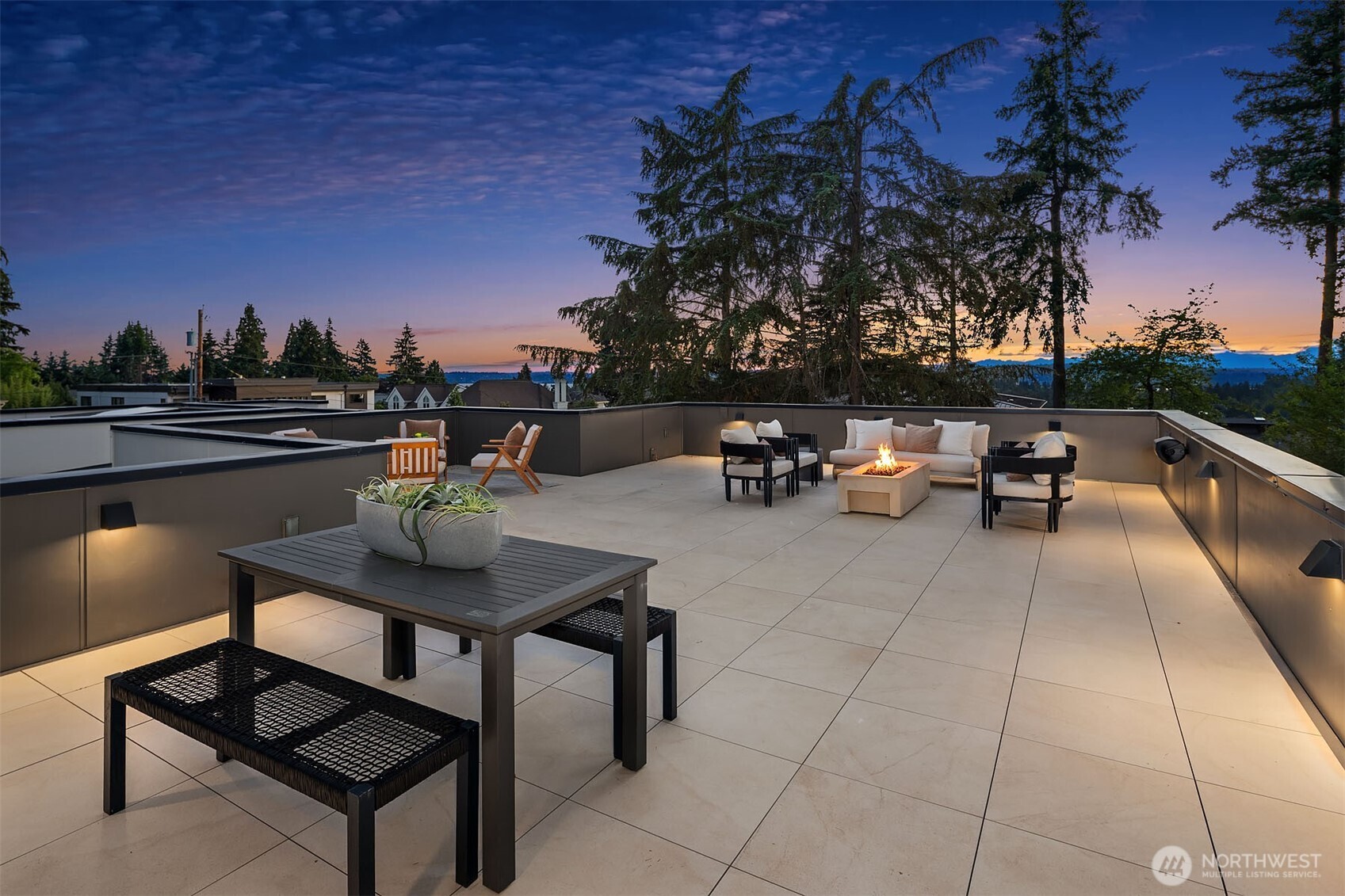 Private rooftop deck with city and mountain views