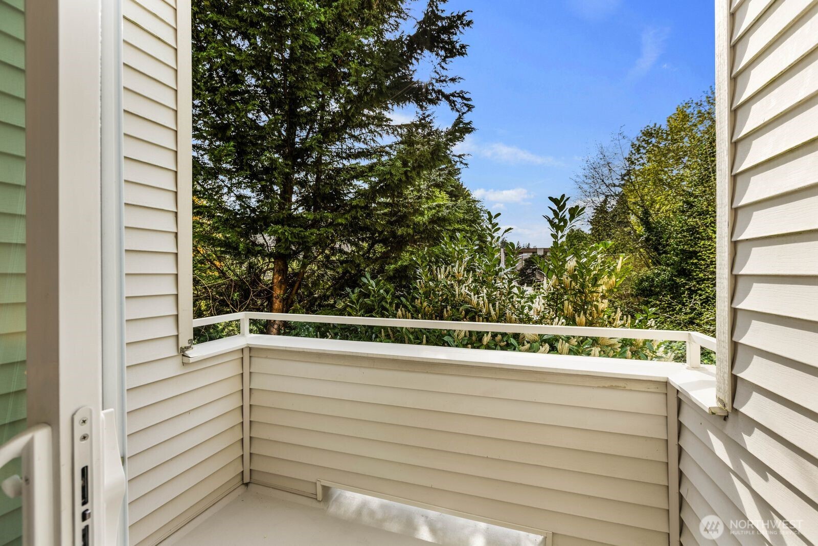 Large patio backs up to a greenbelt
