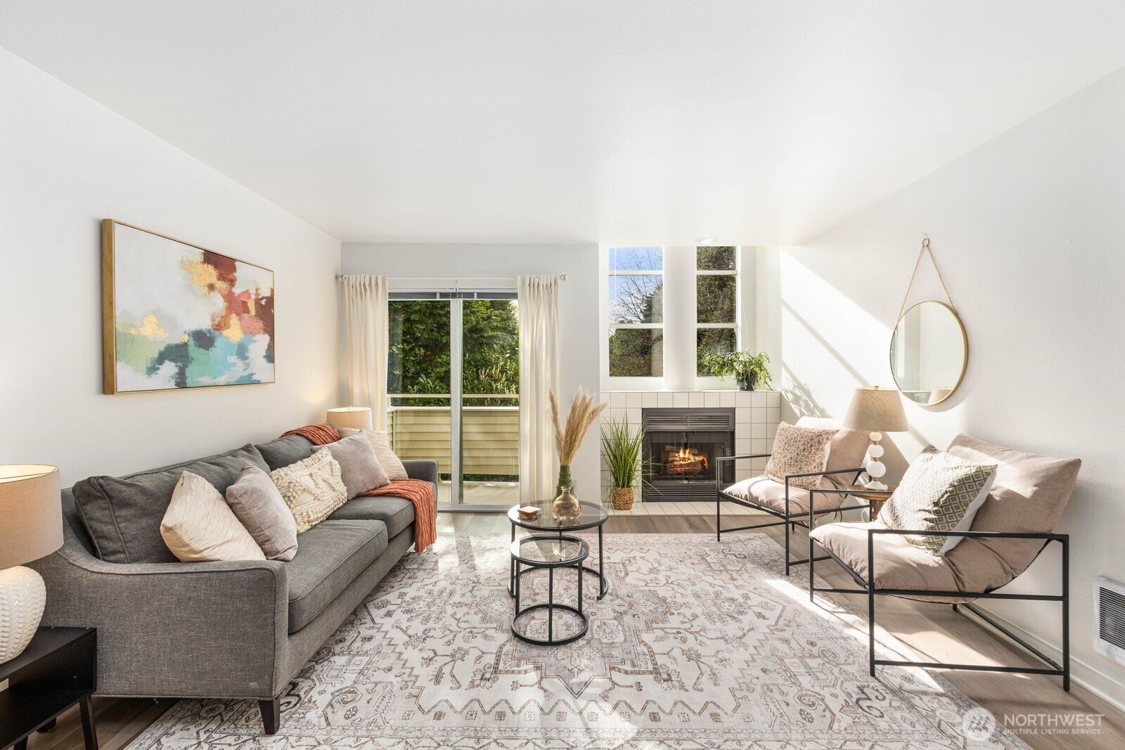 West facing living room with large windows and patio provide lots of light