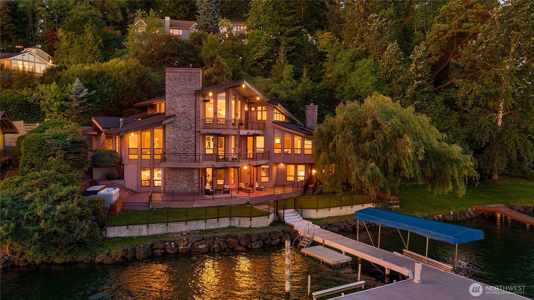 6670 SQF Low-Bank Waterfront Estate in twilight