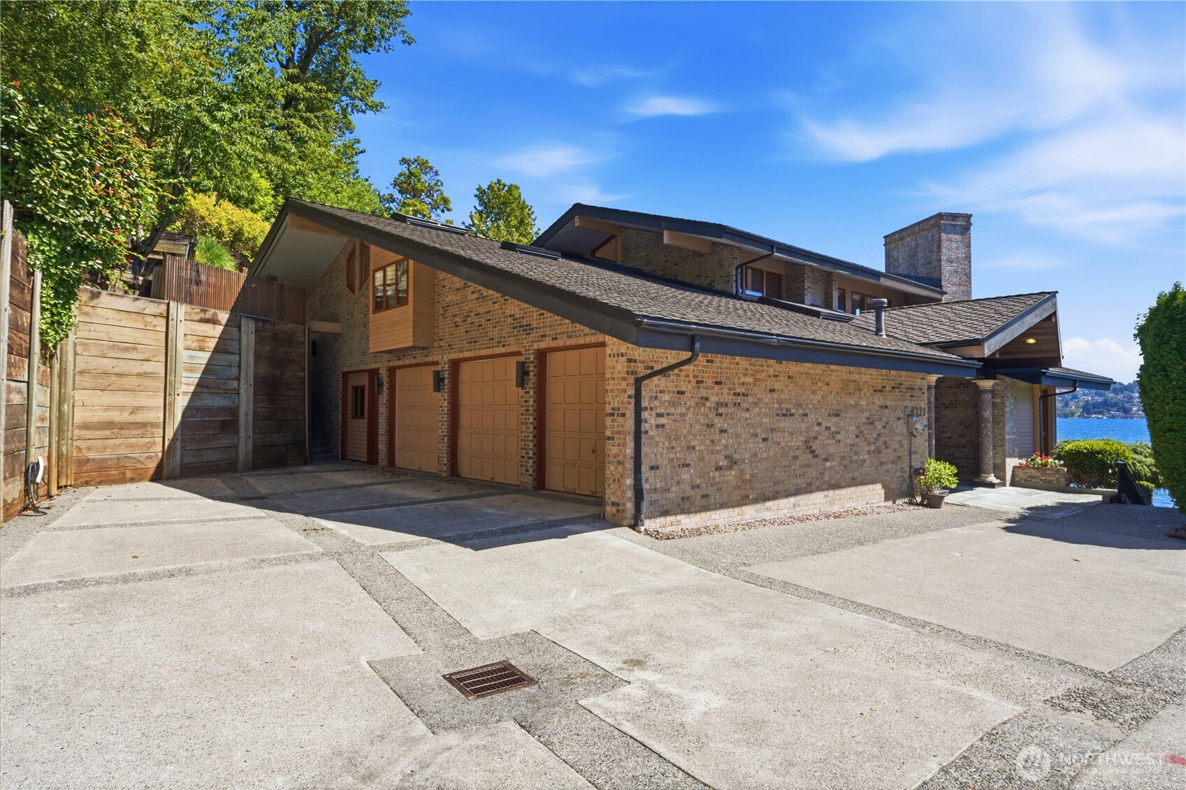 Huge 3-car garage with EV charger, ample guest parking, level!