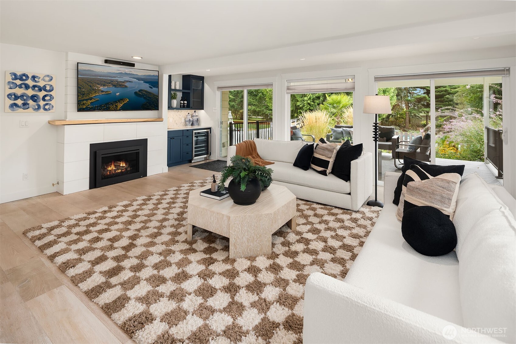 Also on the main floor is the spacious bonus room with wet bar and  access to a covered deck and the pool!