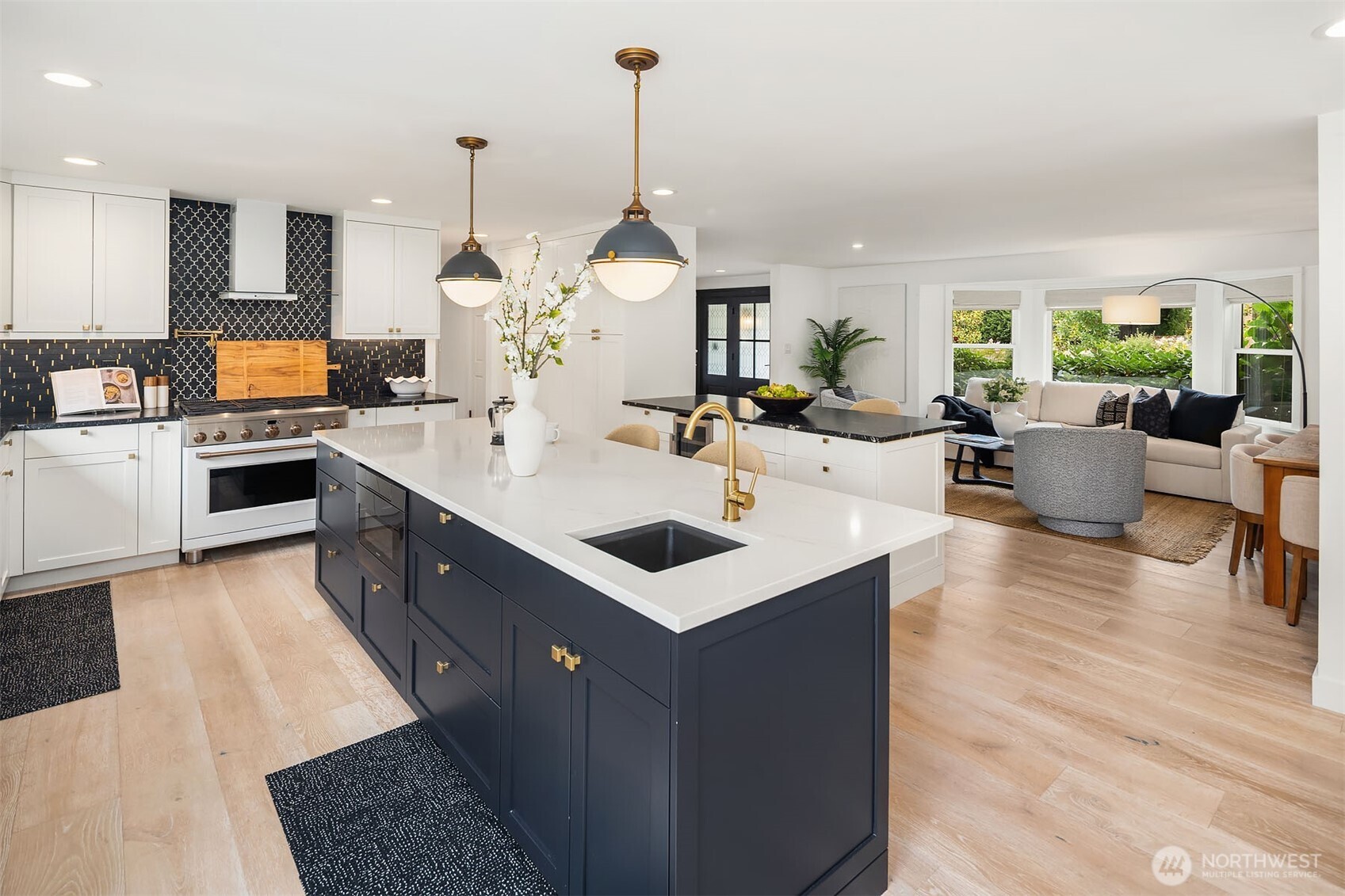 Gorgeous chef's kitchen with Cafe Brand appliances. Double island and plenty of space for gatherings.