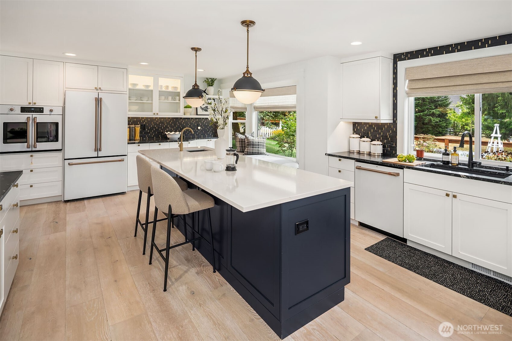 Notice the gorgeous appliances, double oven, gas range, top notch!