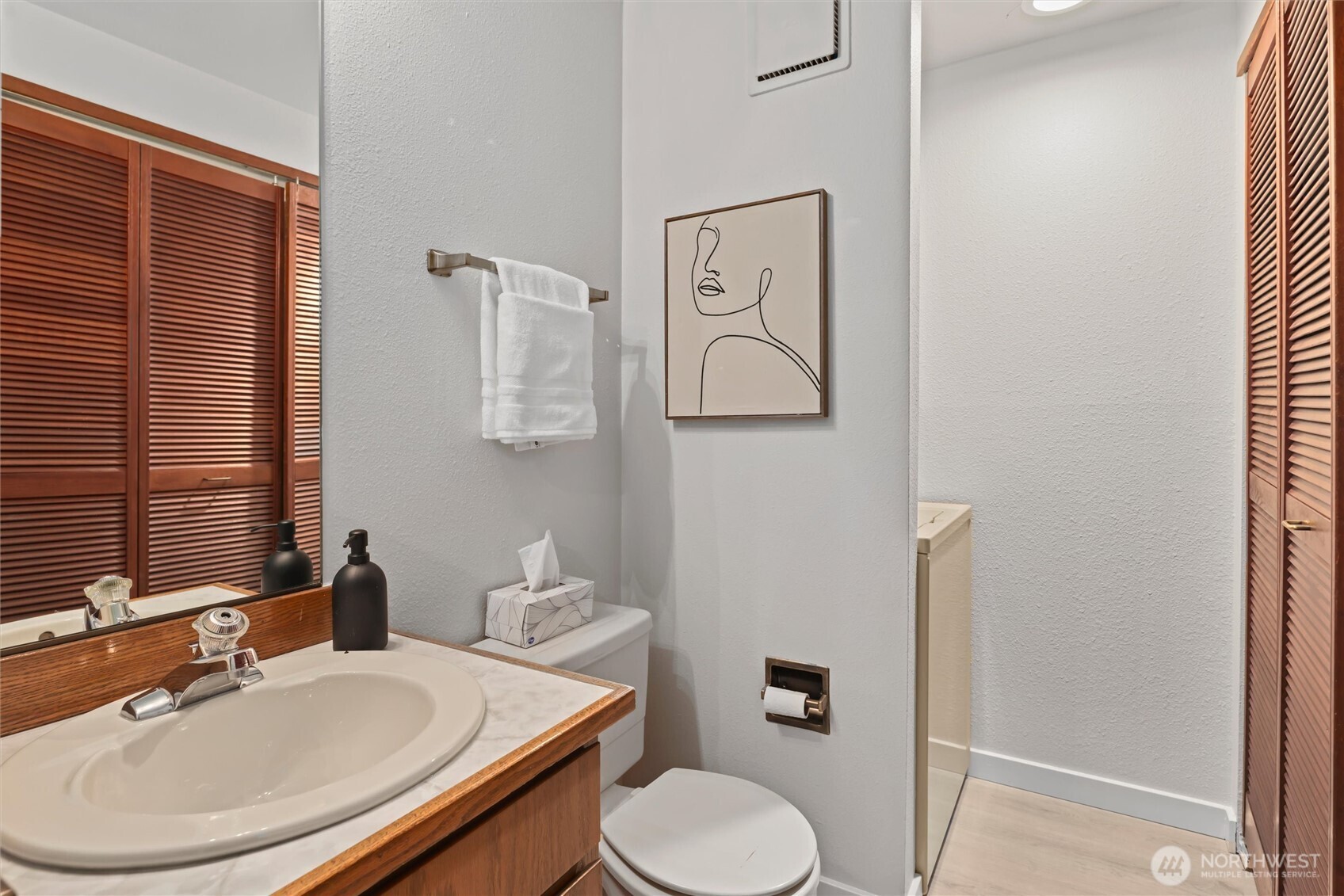 Main level powder room and laundry.