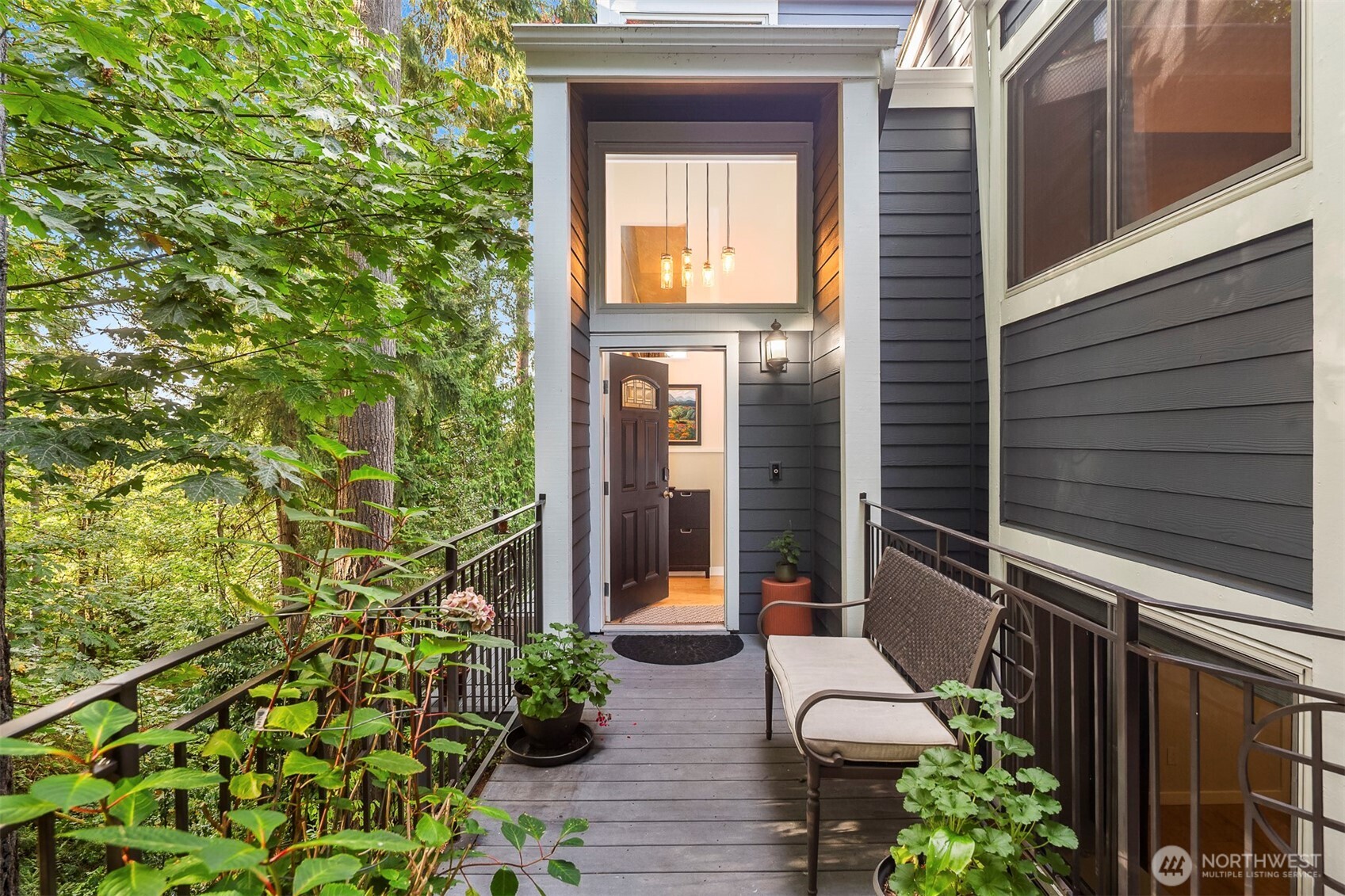 Signature Pacific Northwest Architecture surrounded by lush green forests