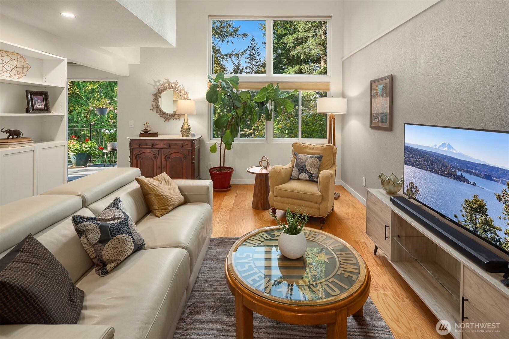 Classic, trendy updates that include hardwood floors, newer updated double hung windows that open you up to this peaceful setting