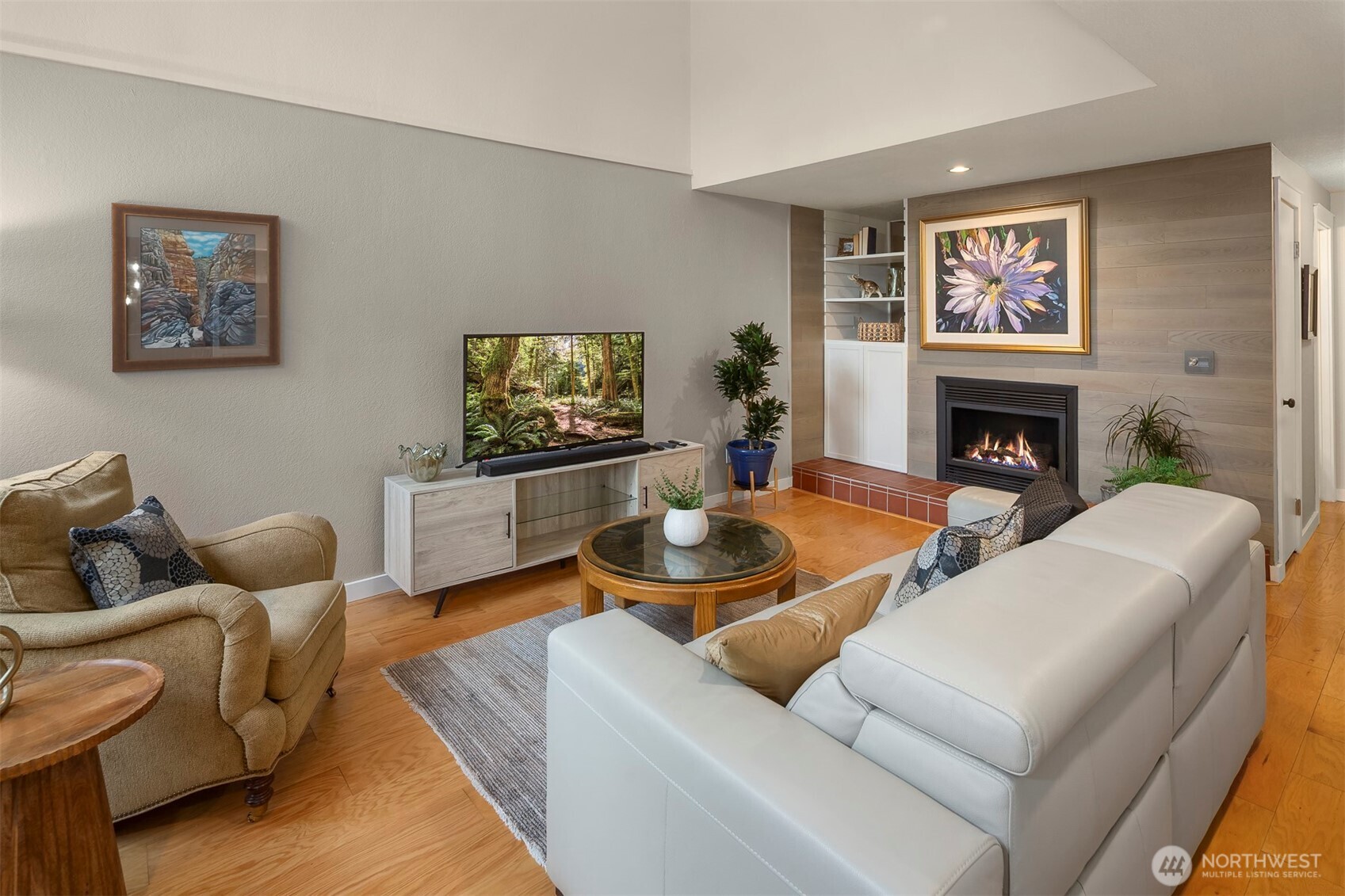 Relax and entertain in this generously sized family room warmed by a cozy fireplace.