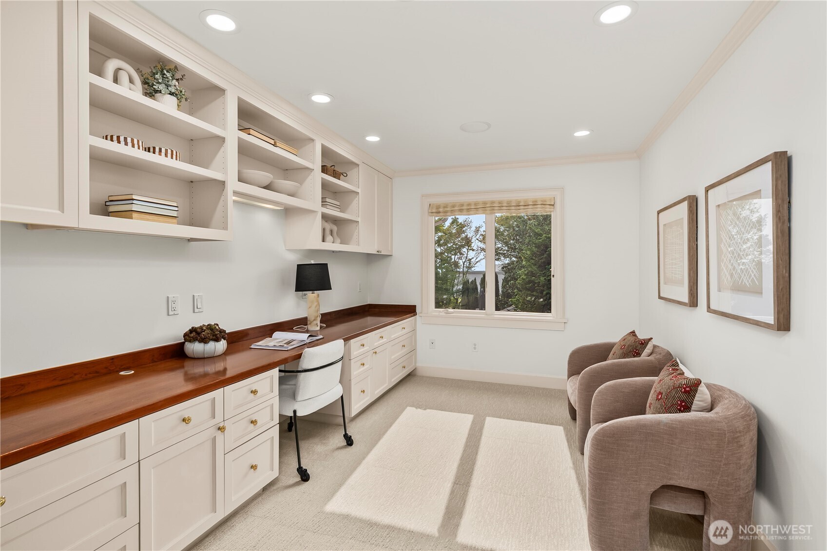 uilt-in cabinetry, generous workspace, abundant storage, and natural light—ideal for working from home