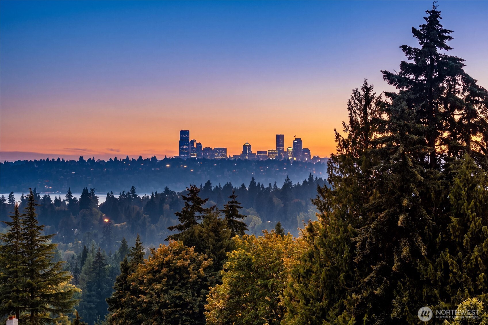 Enjoy views of the city skyline and lake of Washington framed by lush Pacific Northwest greenery