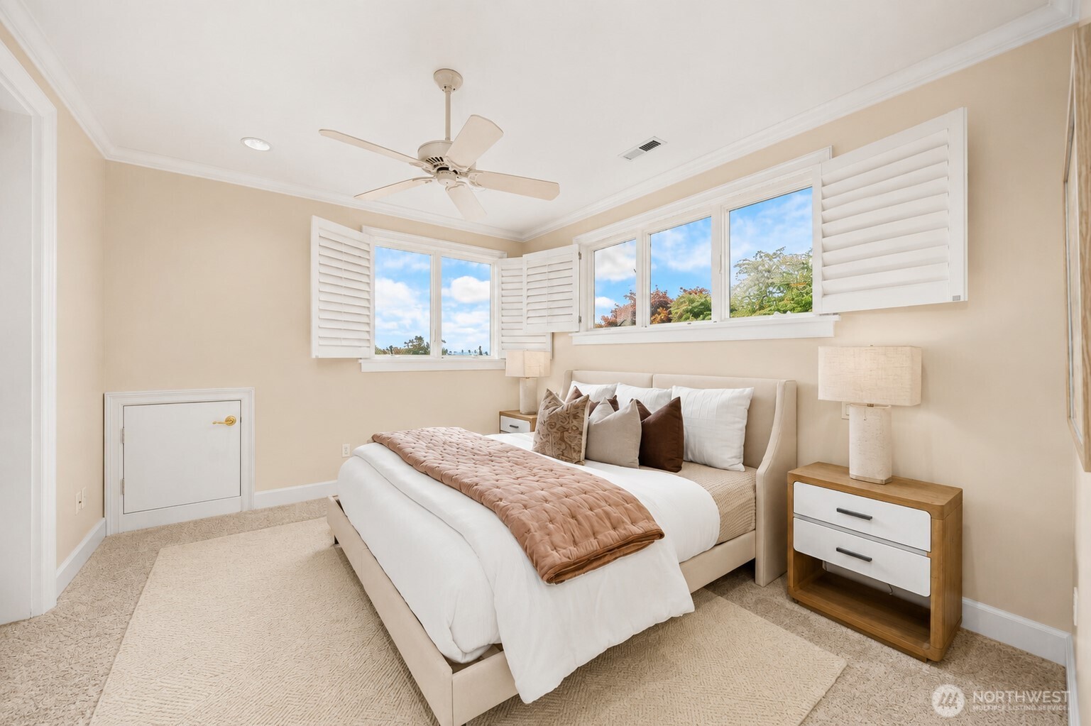 Bright, fully equipped kitchen with abundant cabinetry, natural light, and everything needed for comfortable independent living
