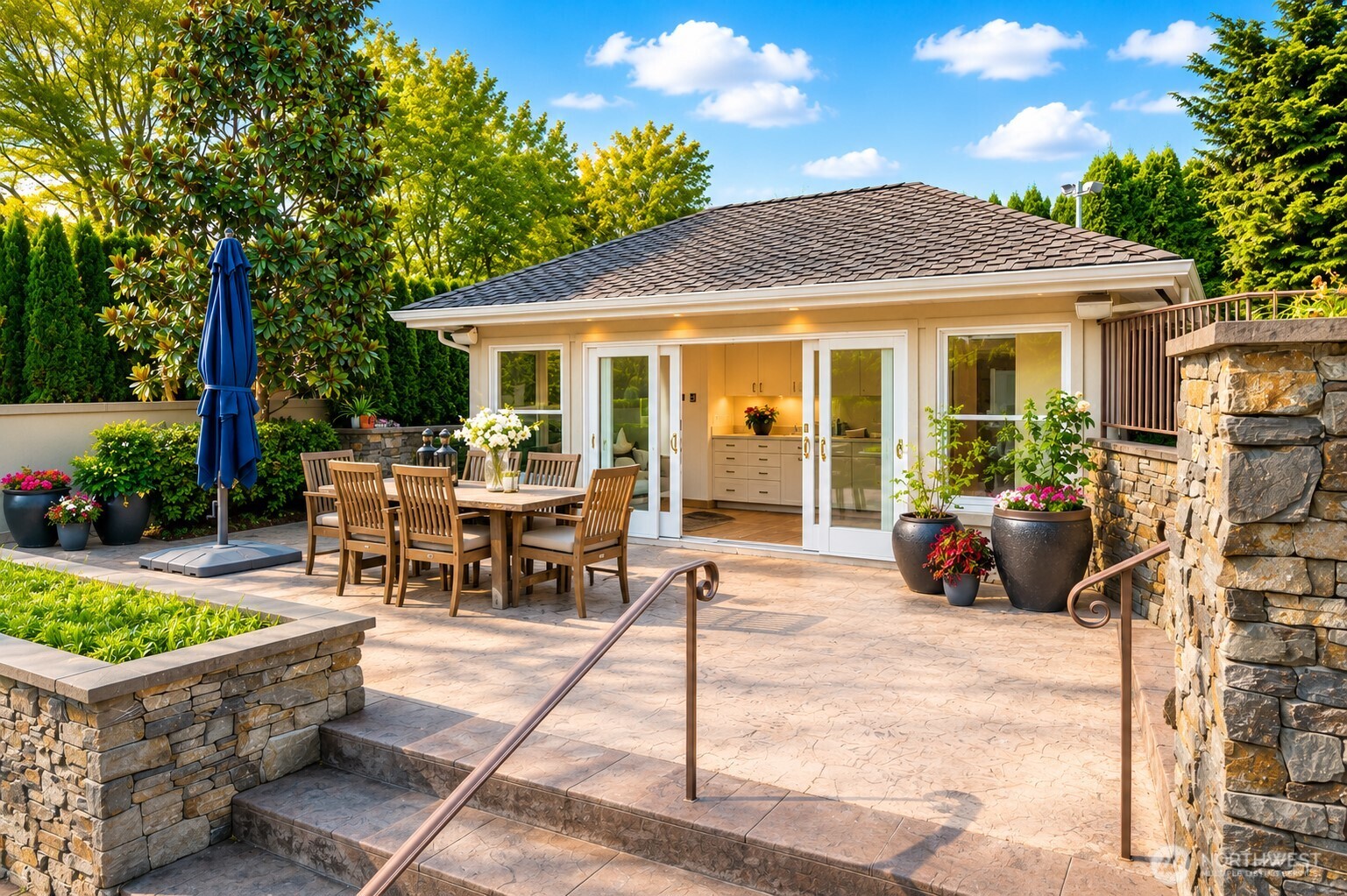 A beautifully designed poolside cabana opens directly to a spacious patio, creating effortless indoor-outdoor living.