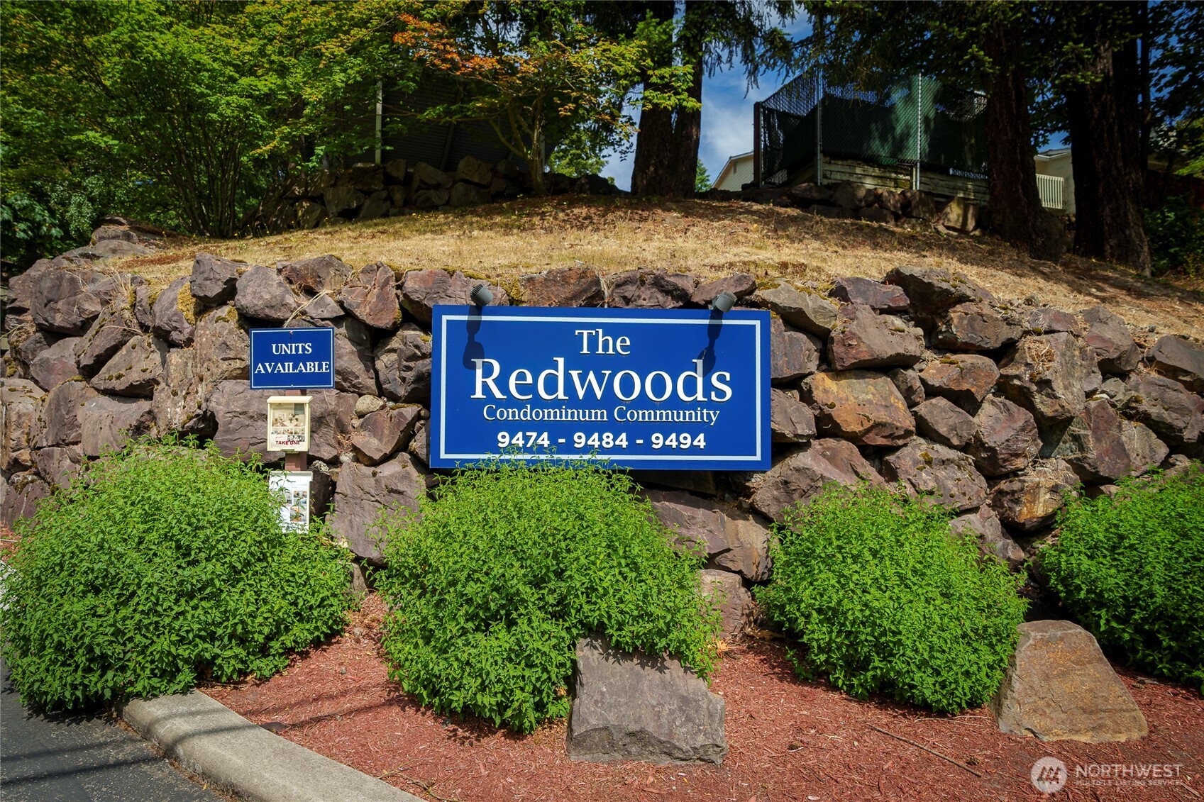 Redwood Condominiums community entrance signage.