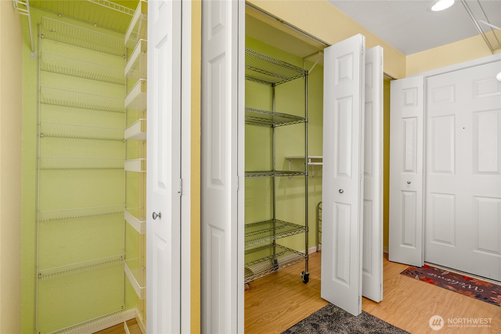 Open studio layout with living area and kitchen beyond.