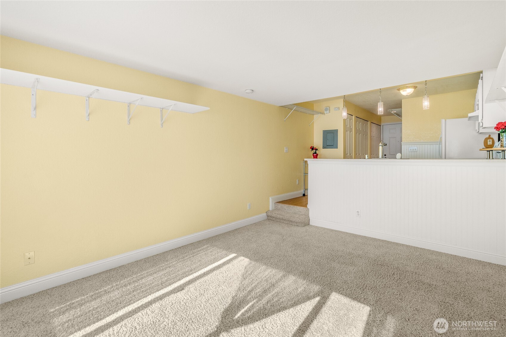 Entry area with multiple closets and built-in storage.