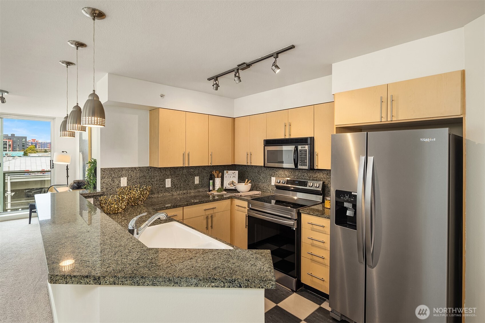 The thoughtful breakfast bar offers additional dining space.