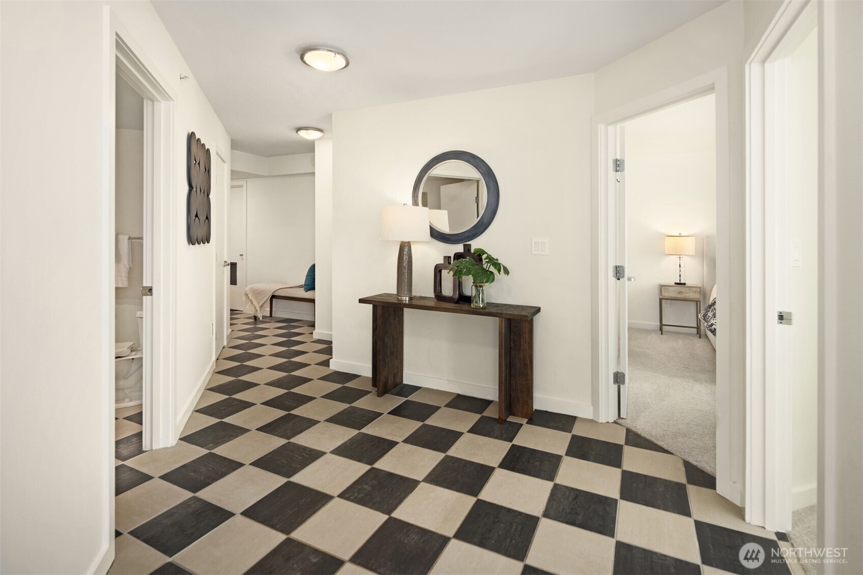 The center of the condo is a roomy area perfect for additional storage and displaying art.