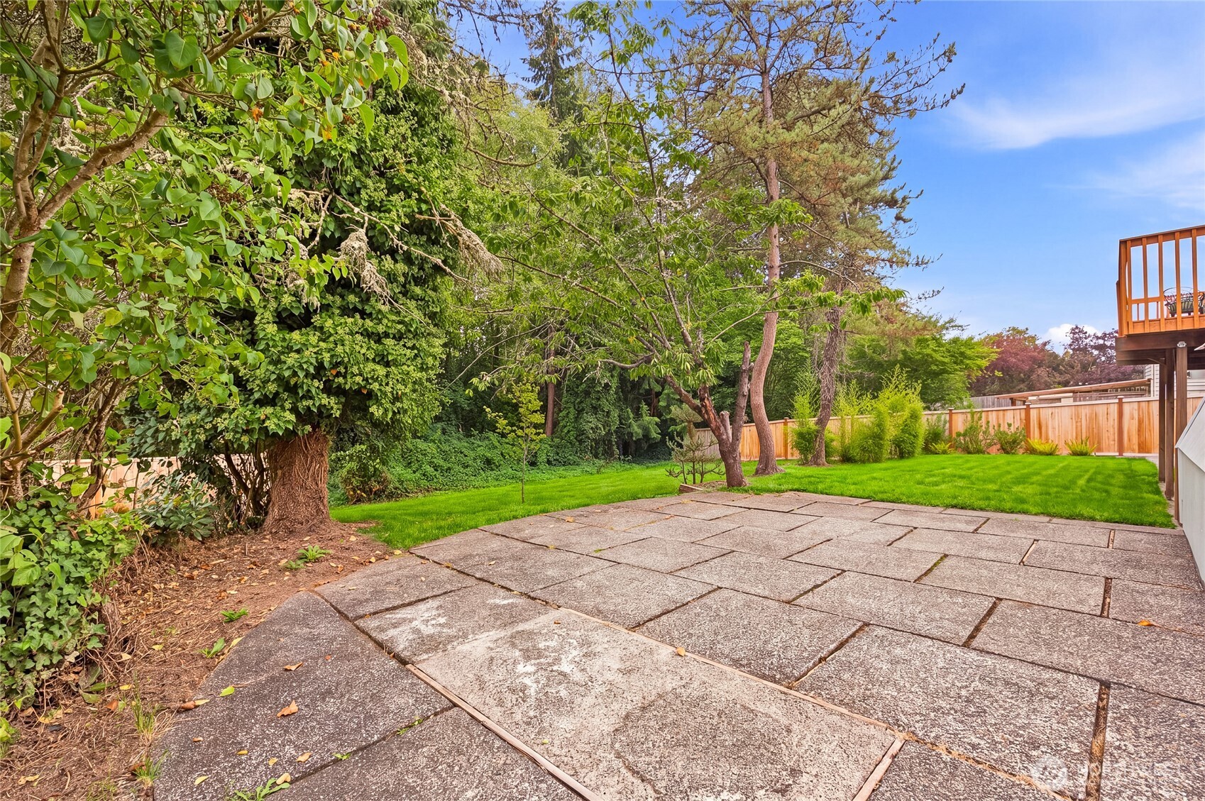 Huge patio backing onto a protected reserve, offering trails and parks.