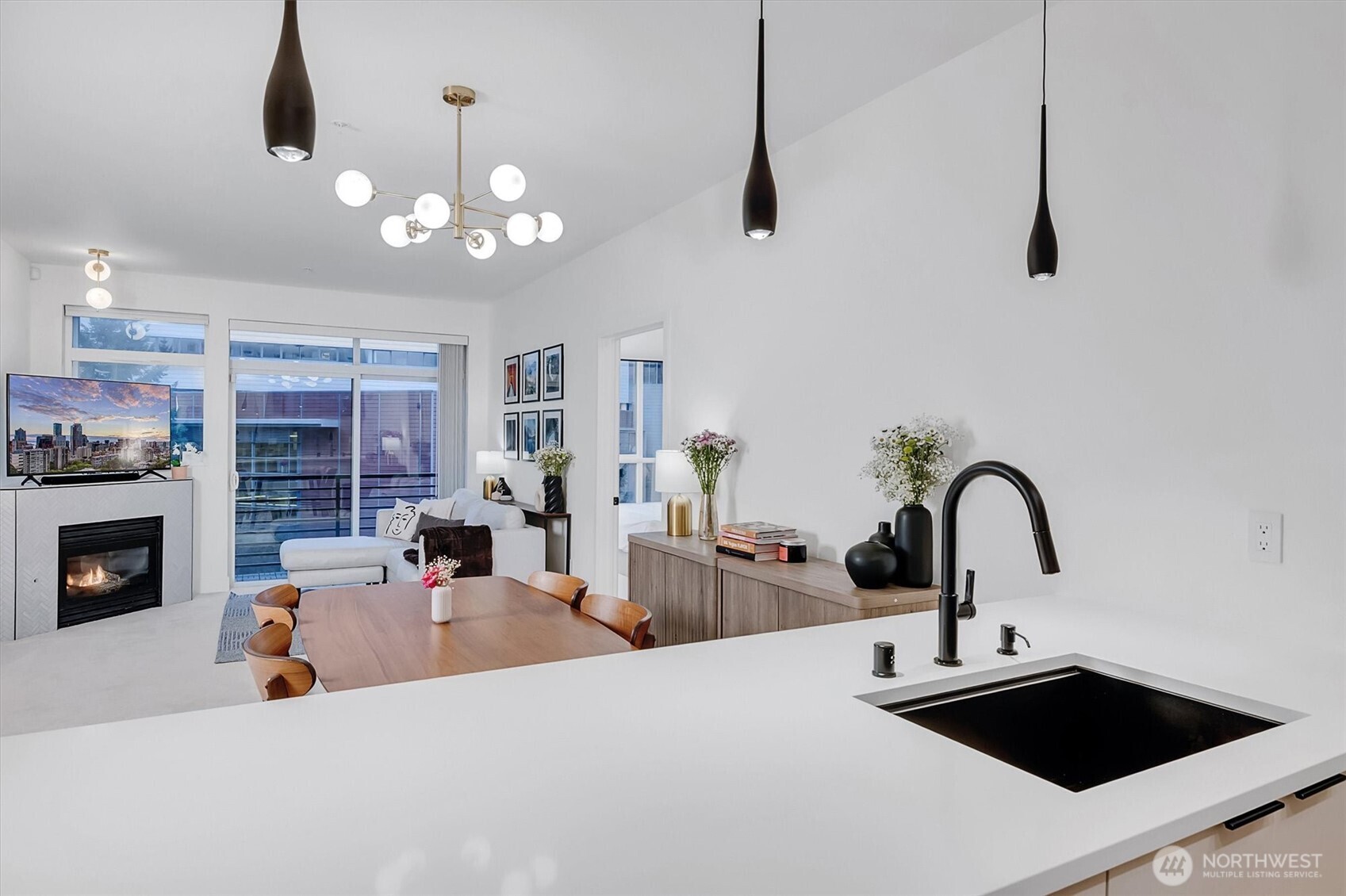 Chef's kitchen with Caeserstone countertops and Dekton Arga stone backsplash!