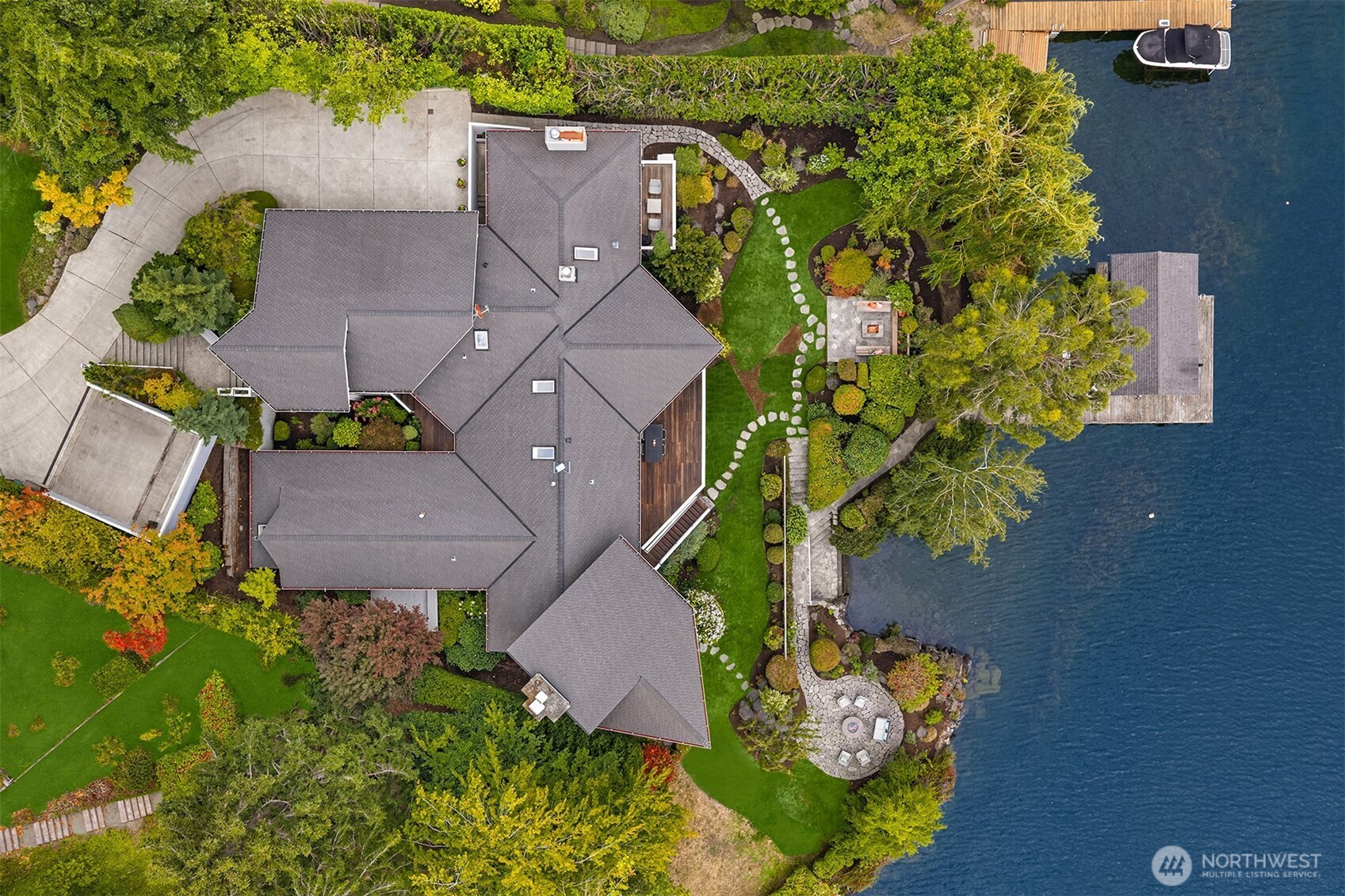 Extensive parking with a 3 car attached garage, a two car guest parking pad and a two car reinforced parking lawn above the home.