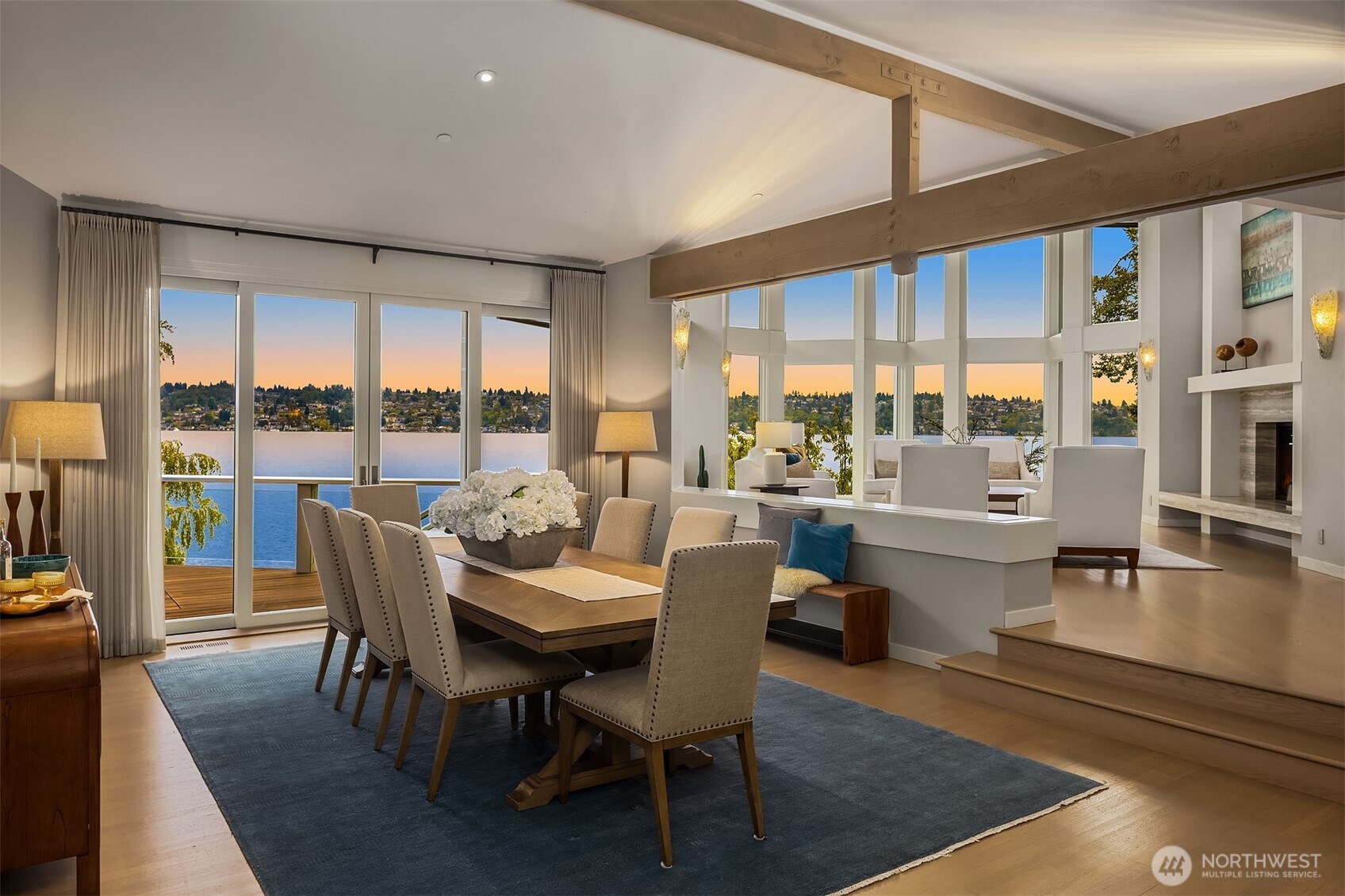 One of a rare few point settings on the lake, providing coveted privacy and incredible views of Mt. Rainier and Lake Washington. The house spans over 100' wide to take advantage of this incredible site.