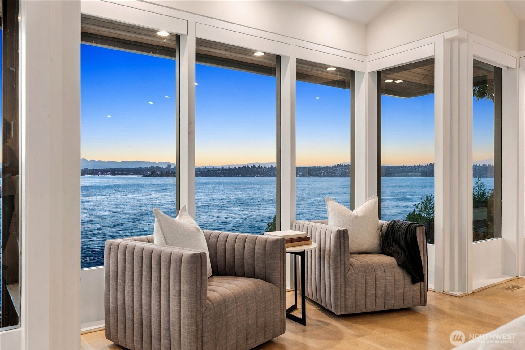 Sweeping westerly views of Lake Washington, the Seattle skyline, and Olympic Mountains.