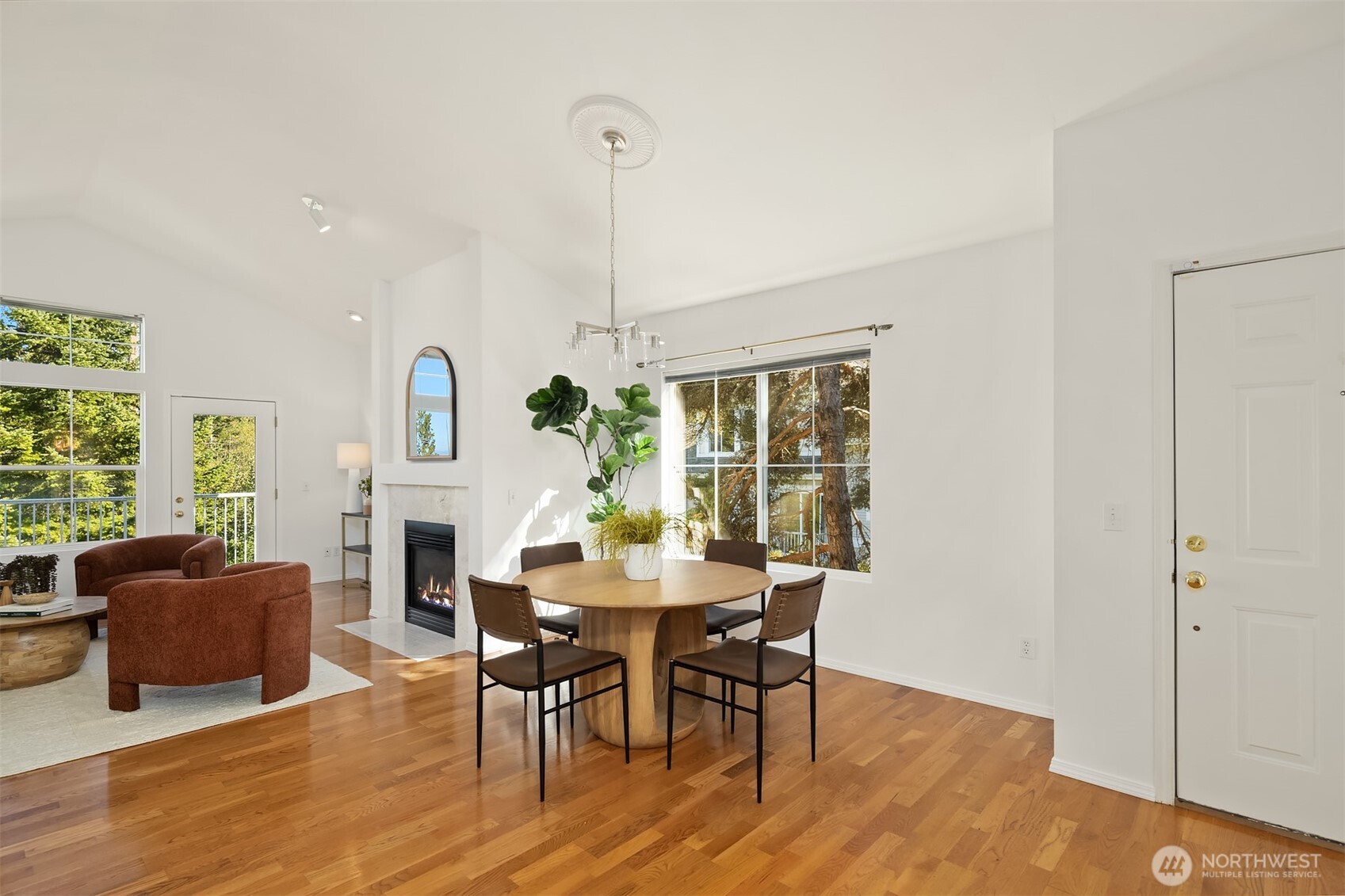 Crowned with vaulted ceilings, its spacious layout lives like a single-family home.