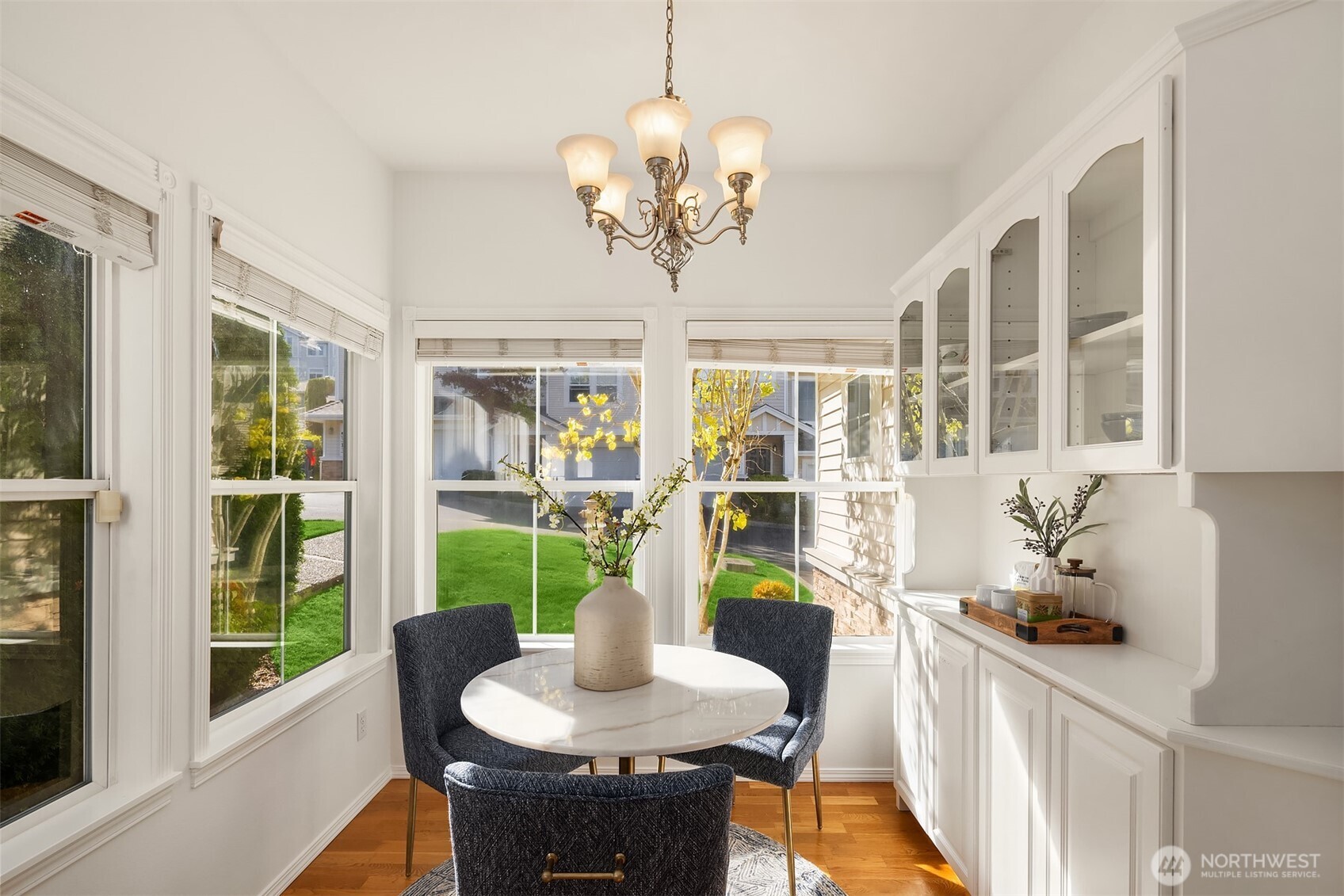 Wrap around windows make this a sunny spot for casual meals.