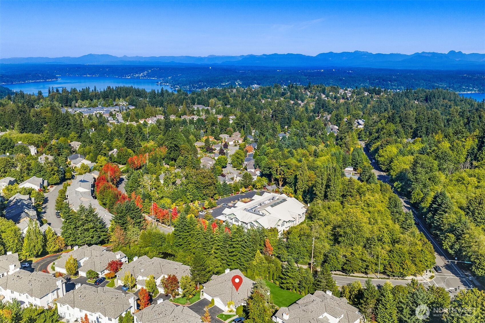 This premier duplex unit backs to a lush lawn and row of privacy trees.