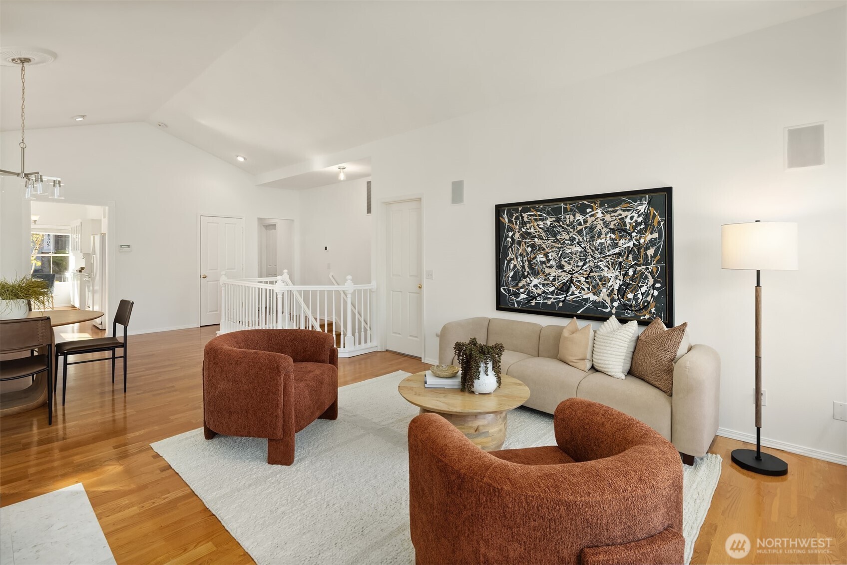 Genuine hardwood floors flow through the main living areas.