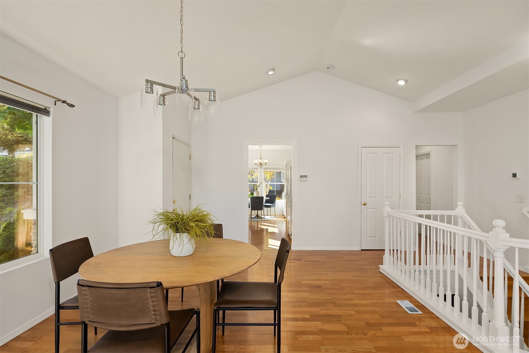The open dining area can adapt from intimate meals to holiday gatherings.